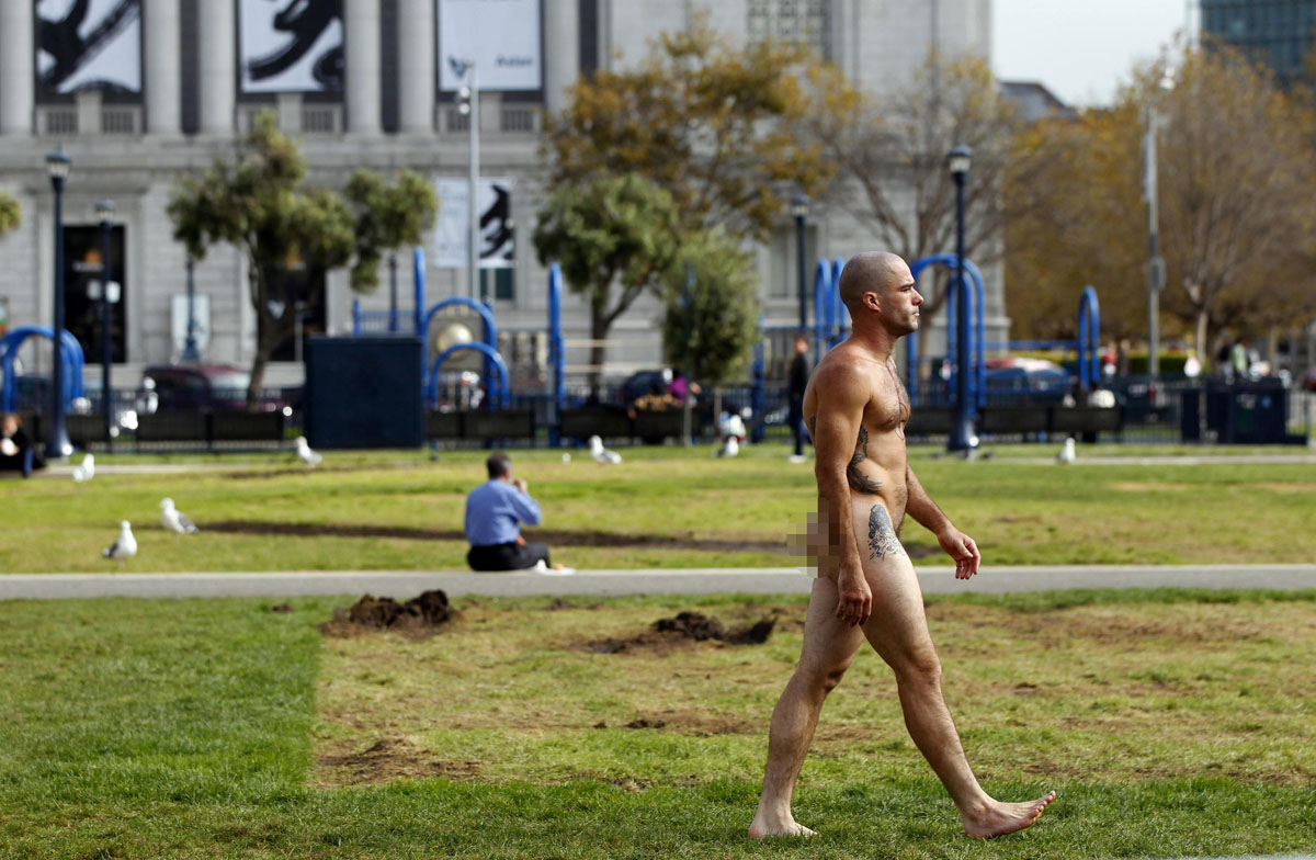 A man, who identified himself as Ocean, walks nude through Civic Center Pla...