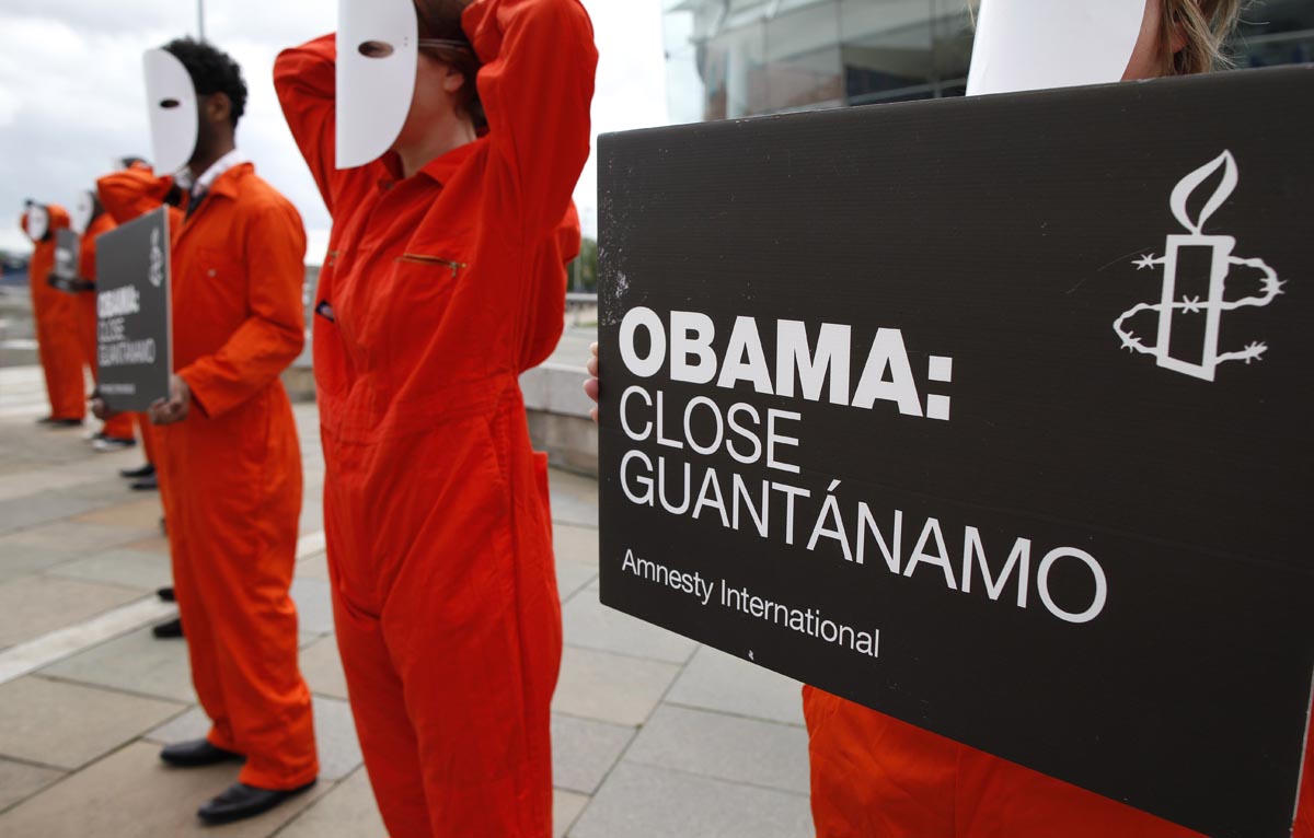 at Guantanamo Bay during a photo call calling on U.S. President Barrack Oba...