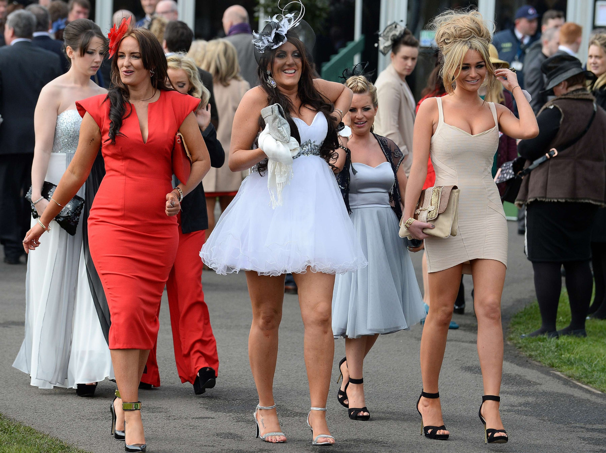 Ladies day at the Grand National: high heels, beer and horses.