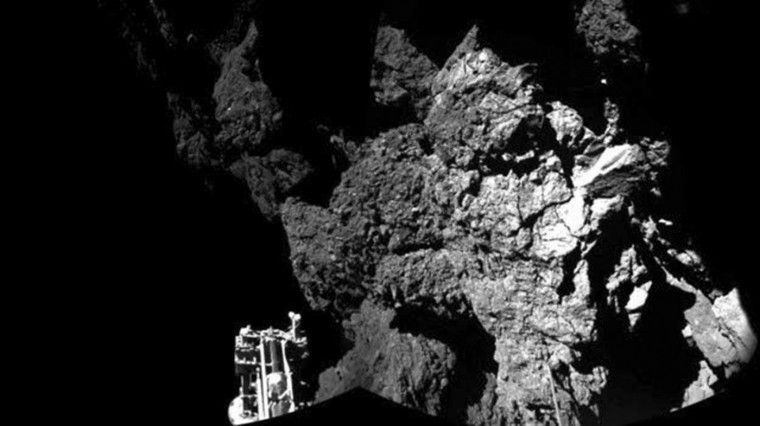 A probe named Philae is seen after it landed safely on a comet, known as 67P/Churyumov-Gerasimenko, in this CIVA handout image released November 13, 2014. The European probe that landed on the comet in a first for space exploration is safely anchored on the surface despite technical problems, pictures beamed half a billion kilometres (300 million miles) back to Earth showed on Thursday. The lander, named Philae, was launched from its mothership Rosetta on Wednesday as it orbited comet 67P/Churyumov-Gerasimenko, the climax of a 10-year-odyssey for the European Space Agency (ESA). (ESA/Rosetta/Philae/CIVA/Handout via Reuters)