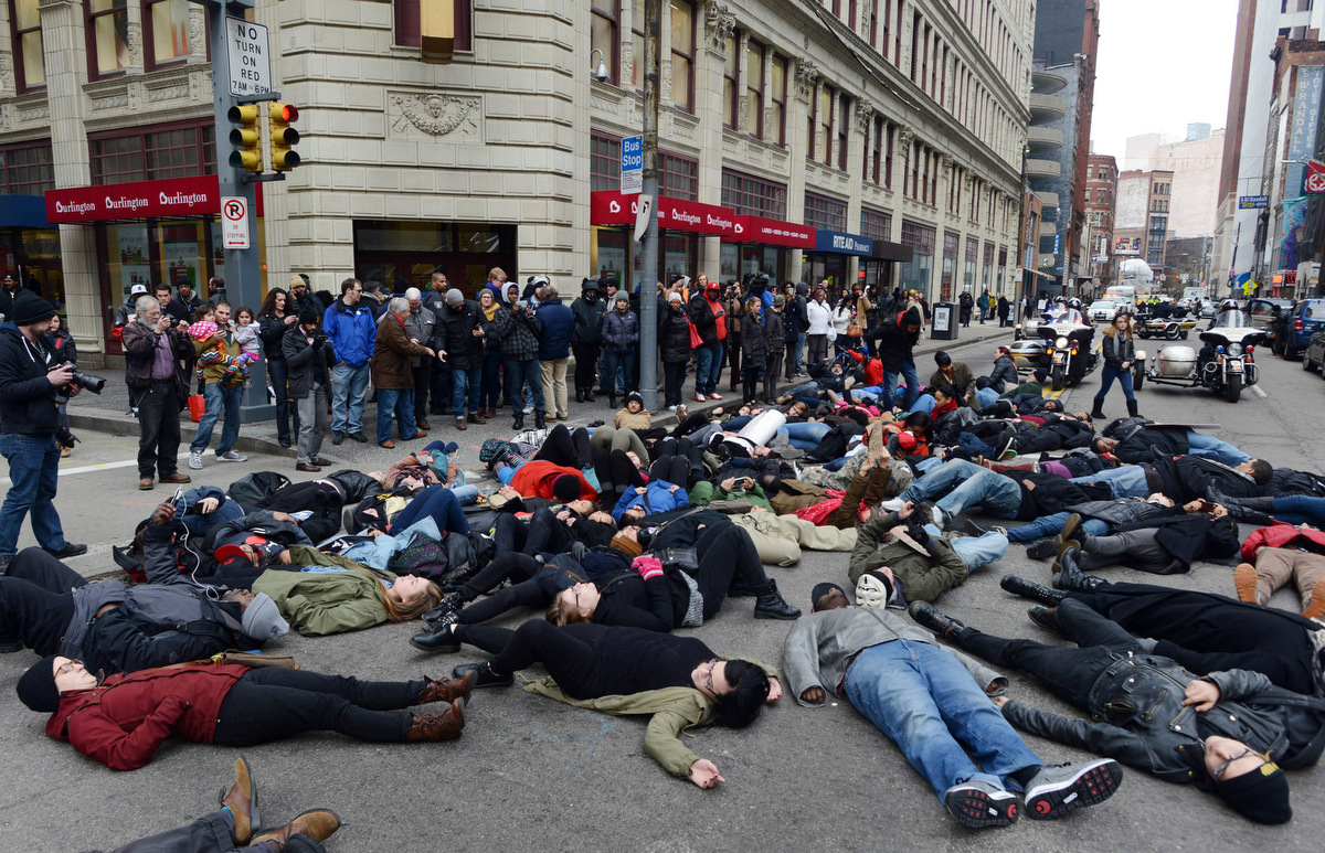 Image result for protesters lying down