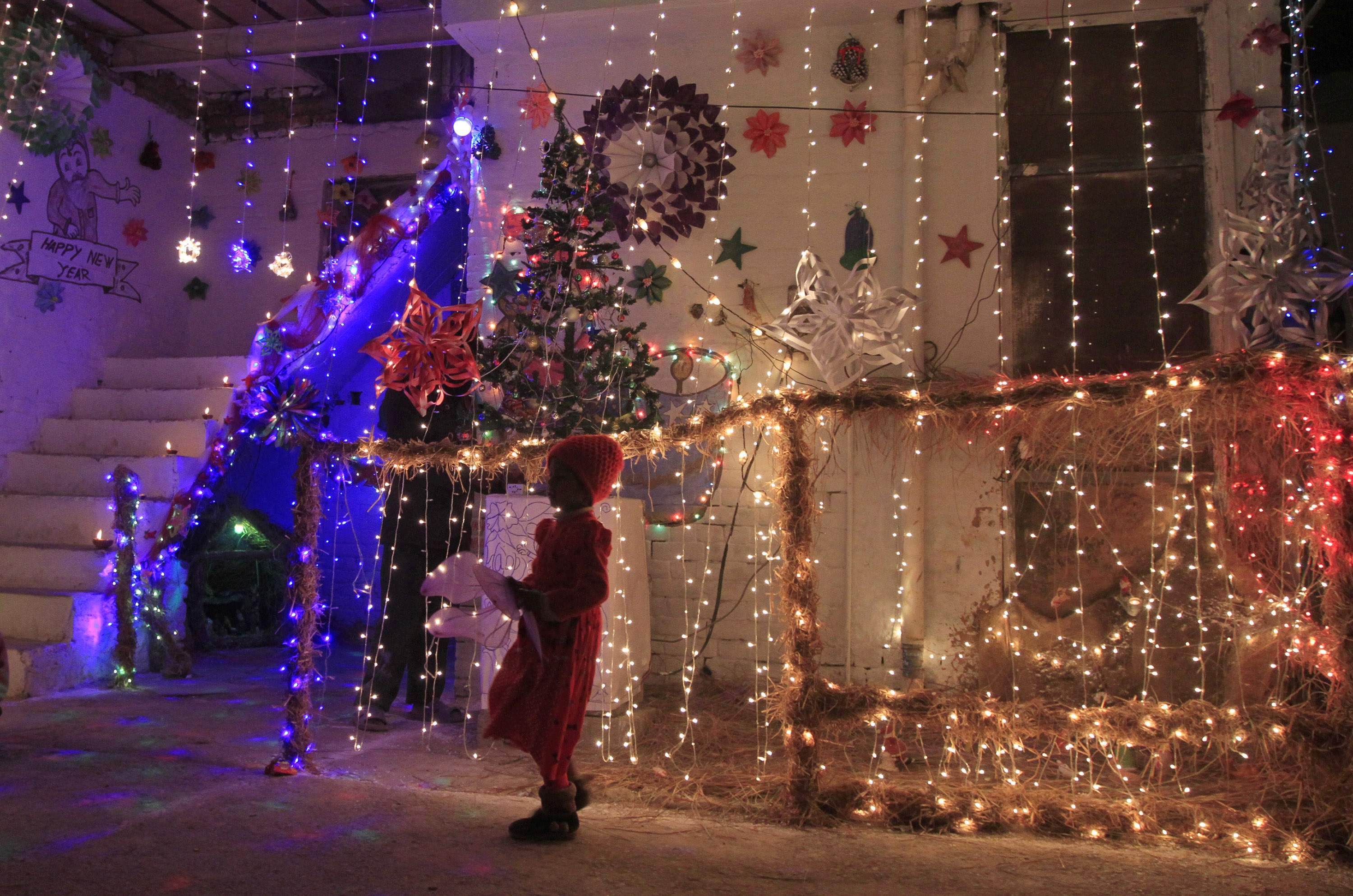 a christmas tree is seen on a balcony on christmas eve in a christmas tree is seen on a balcony on christmas eve in