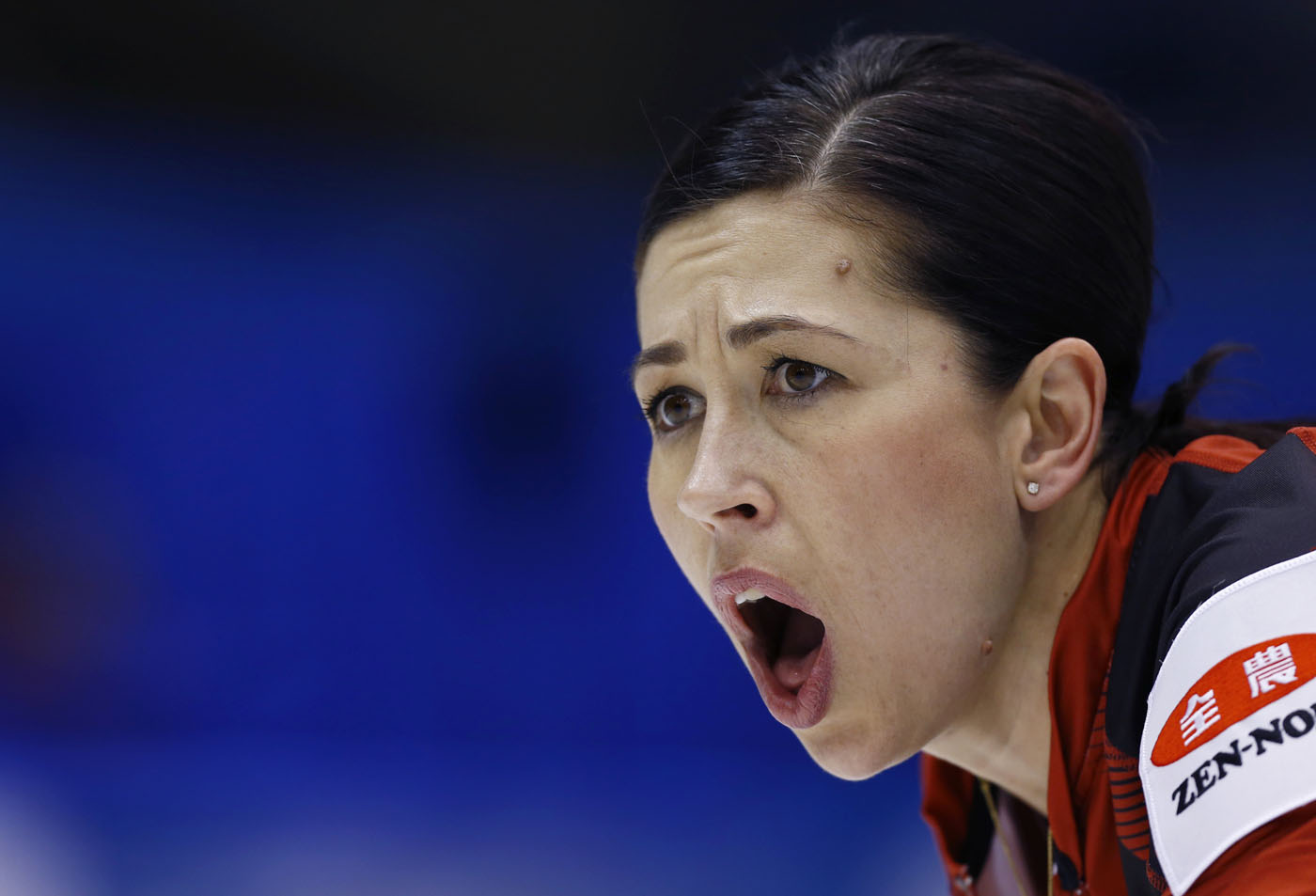Canada&#39;s <b>Jill Officer</b> yells as the team plays Switzerland during the second <b>...</b> - AP-Japan-Women-World-Curling-Championships_001
