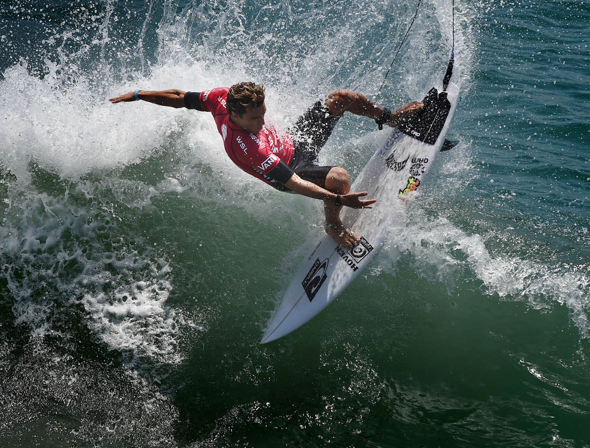 Surfing competition beside historic Huntington Pier