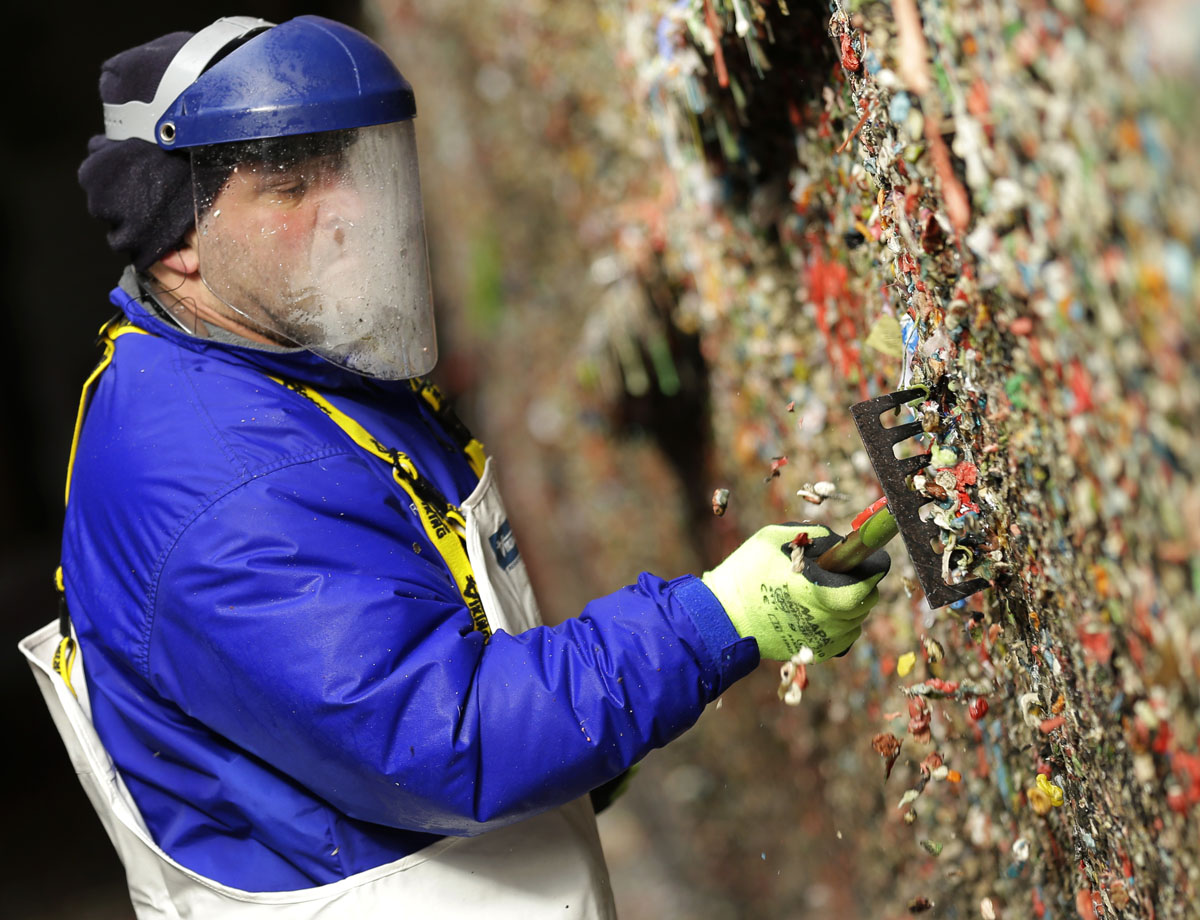 Cleaning the gum wall at Seattle’s Pike Place Market