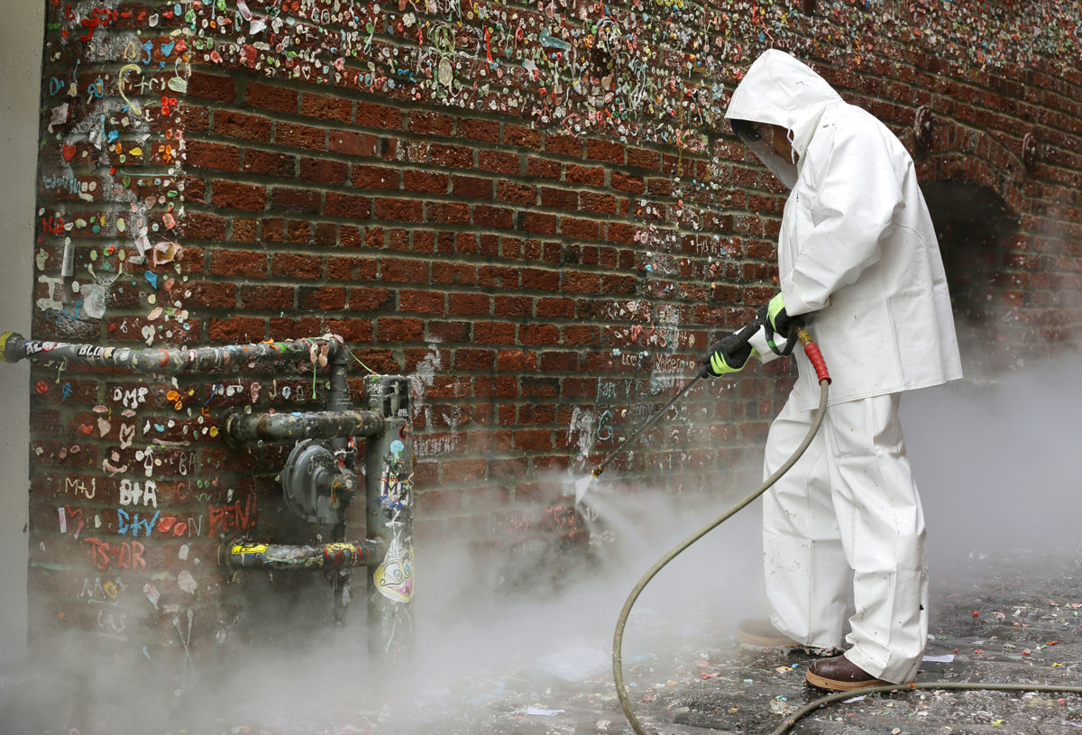 Cleaning the gum wall at Seattle’s Pike Place Market