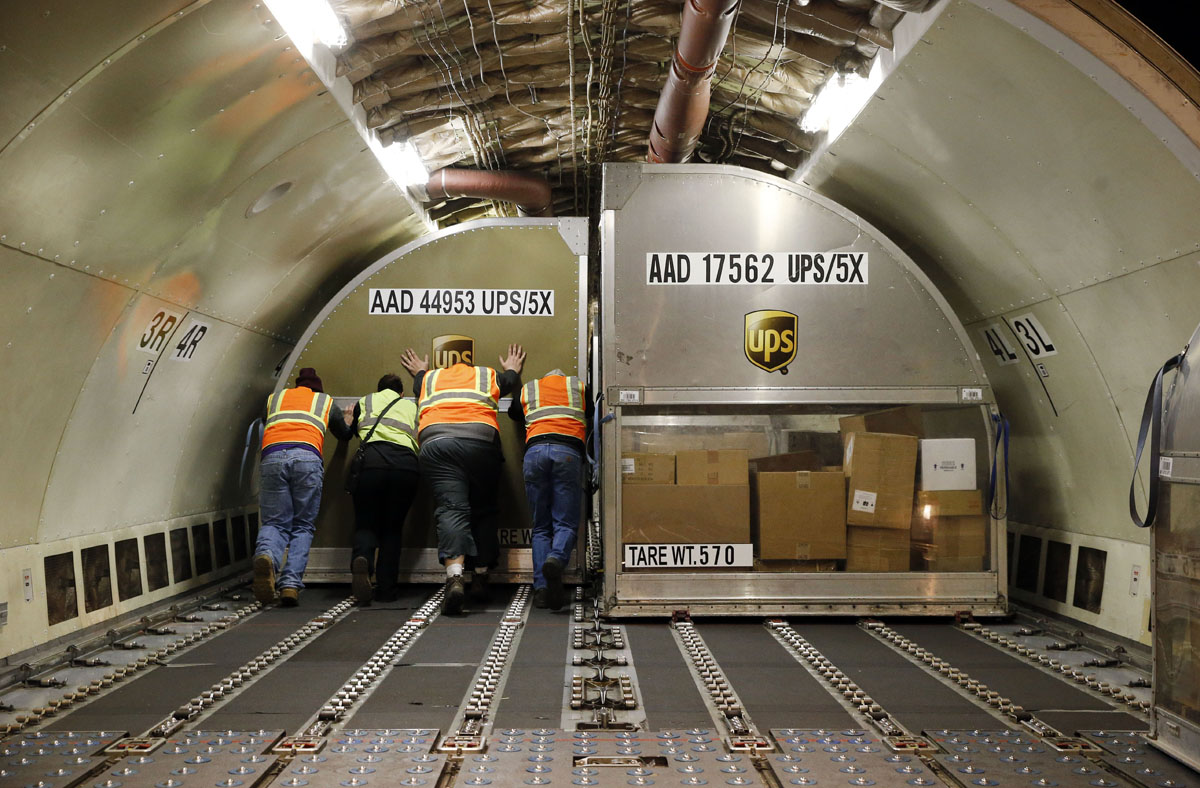 Shipping mania rushing to deliver millions of holiday gifts